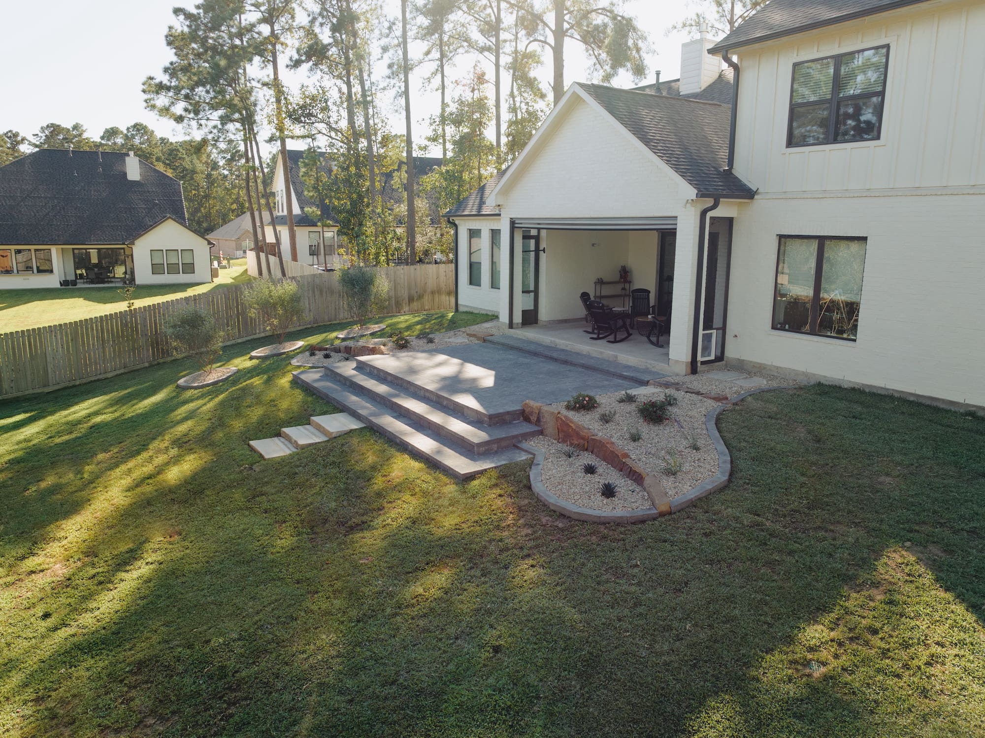 Landscape lighting and outdoor audio installation by Theiss Landscape Works